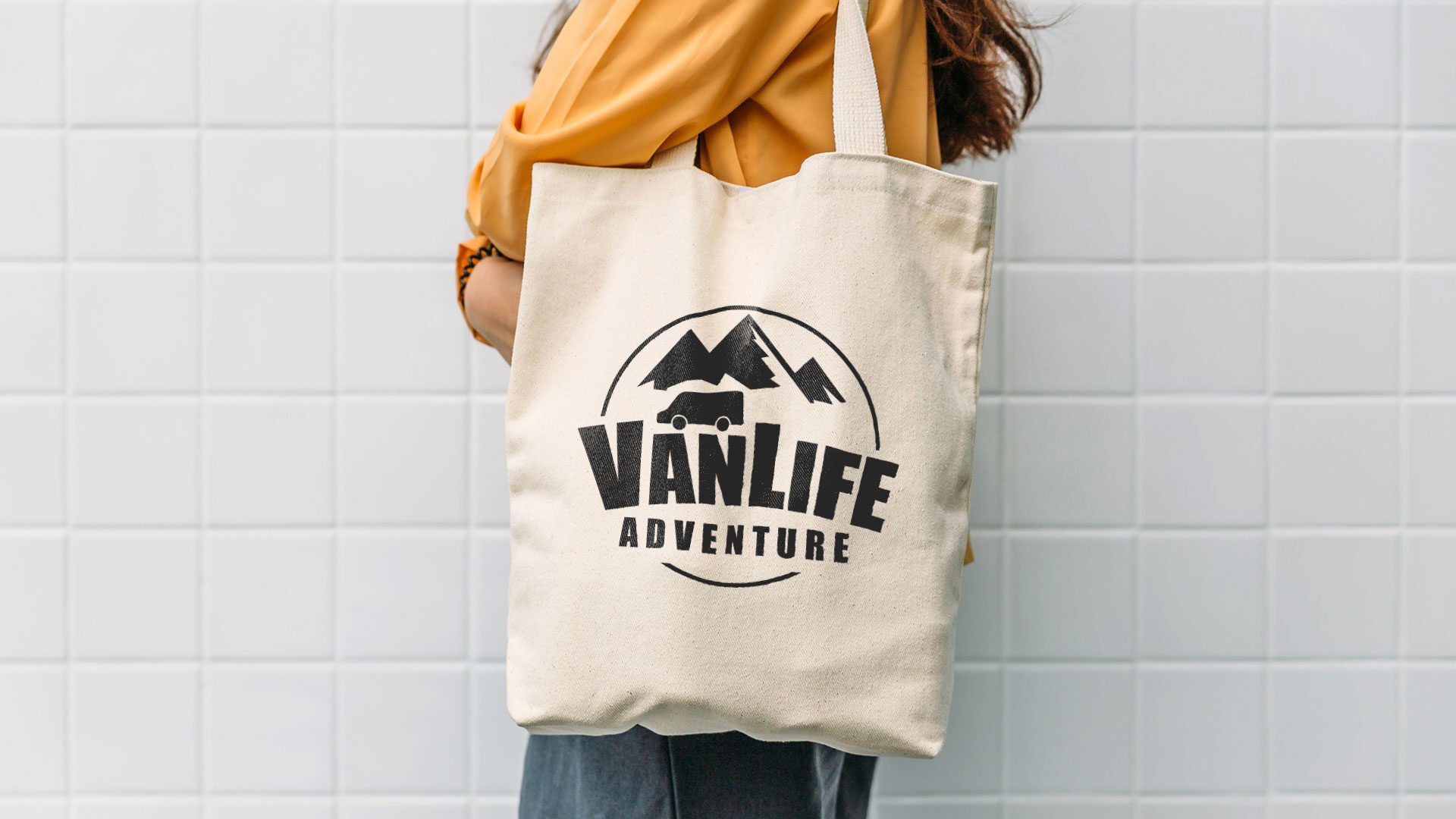 woman holding a VanLife tote bag eco-friendly campervan